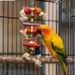 Birdie Bella hanging bird toy with colourful wooden pieces rope knots beads and bell