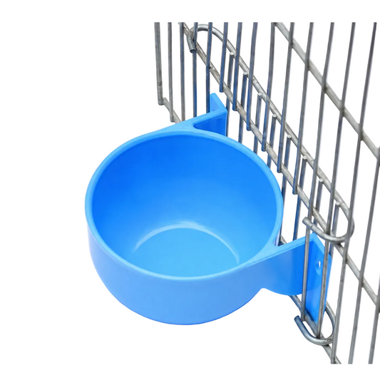 Blue round bird water bowl attached inside a bird cage